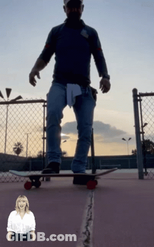 Man Riding Skateboard With Woman In Background GIF