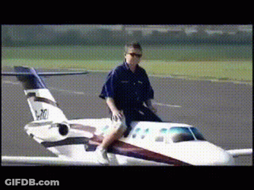 Man Riding Small Airplane P-10 GIF