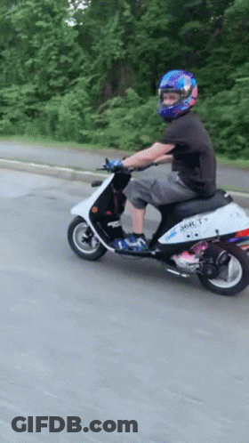 Man Riding Sonic Scooter GIF