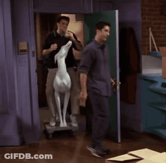 Man Riding Statue Of Dog In Room GIF