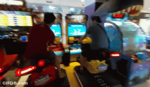 Man Riding Toy Motorcycle GIF