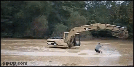 Man Riding Water Ski Next To Excavator GIF