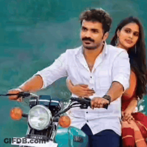 Man Riding Yamaha Motorcycle With Woman On Back GIF