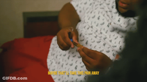 Man Rolling Cigarette Saying Maybe That'll Take This Pain Away GIF