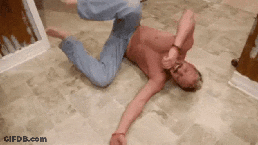 Man Rolling On Floor Laughing GIF