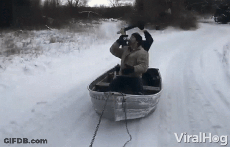 Man Row The Boat On Snow While Drinking GIF