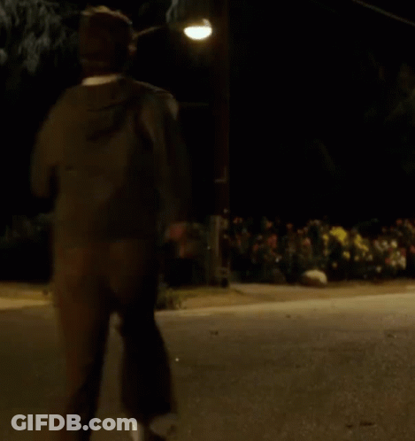 Man Running At Night Under Street Light GIF