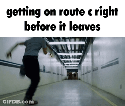 Man Running Down Hallway Getting On Route C Right Before It Leaves GIF