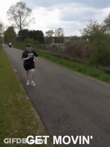 Man Running Down Road Get Movin GIF