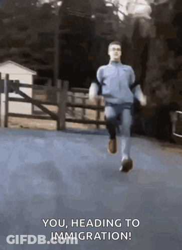 Man Running Down Road Saying You Heading To Immigration GIF