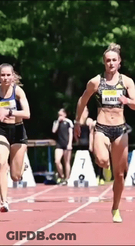 Man Running Down Street Saying Run Run Run GIF
