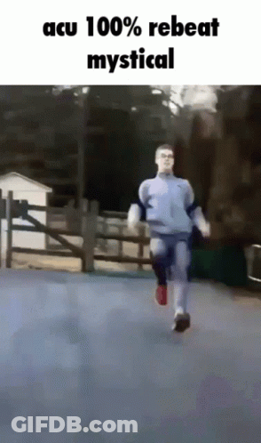 Man Running Down Street With Acu 100% Rebeat Mystical GIF