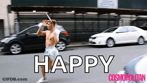 Man Running Down Street With Happy Cosmopolitan GIF