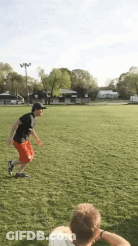 Man Running In Black Shirt And Red Shorts GIF