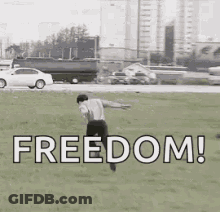 Man Running In Field With Freedom GIF
