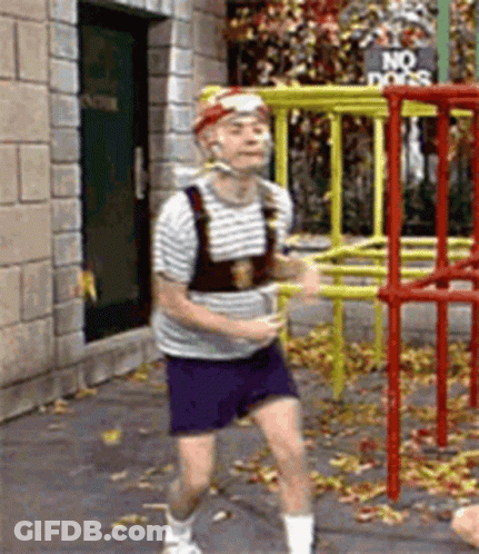 Man Running In Front Of No Dogs Sign GIF