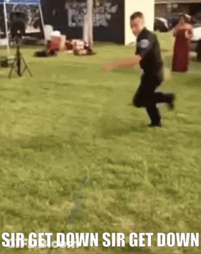 Man Running In Grass Saying Sir Get Down GIF