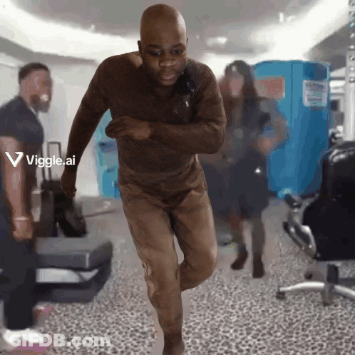 Man Running In Hallway With Viggle Ai Logo GIF