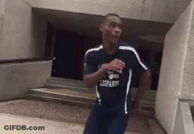 Man Running In Leopard Shirt GIF