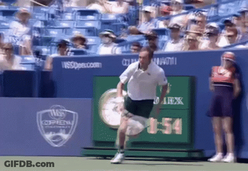 Man Running On Tennis Court With Scoreboard 1:54 GIF