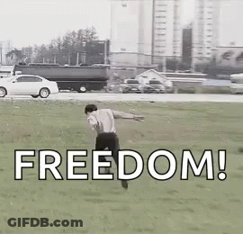 Man Running Through Grass Field With Freedom GIF