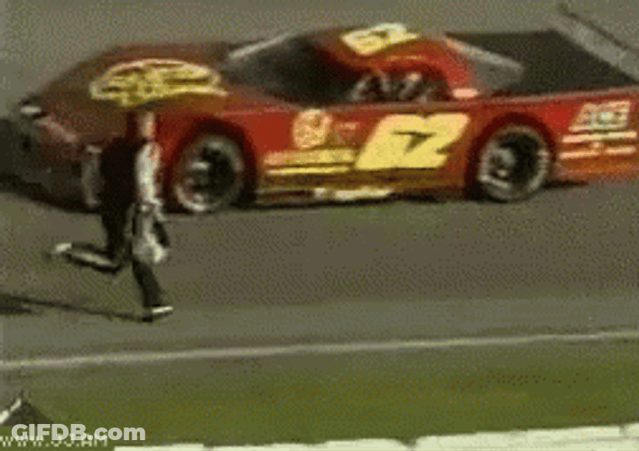 Man Running To The Race Car GIF