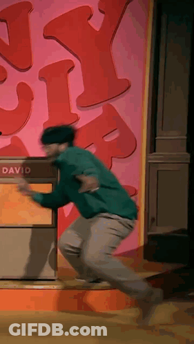 Man Running Towards Box Saying David GIF