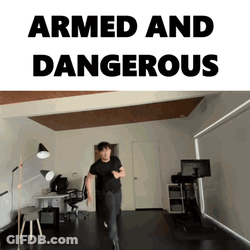 Man Running With Armed And Dangerous GIF