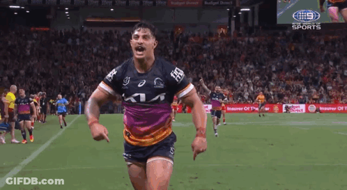 Man Running With Rugby Ball In Front Of NRL.com Banner GIF