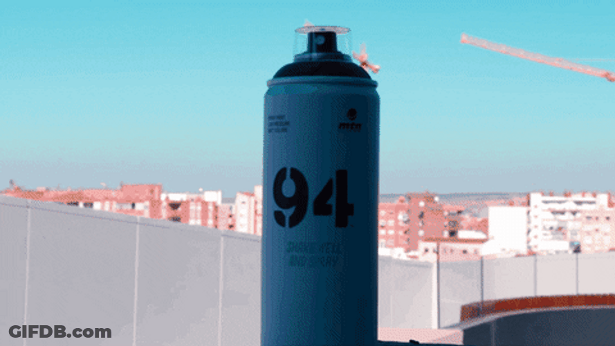 Man Running With Spray Bottle GIF