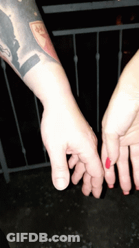Man's Arm With NP Tattoo GIF