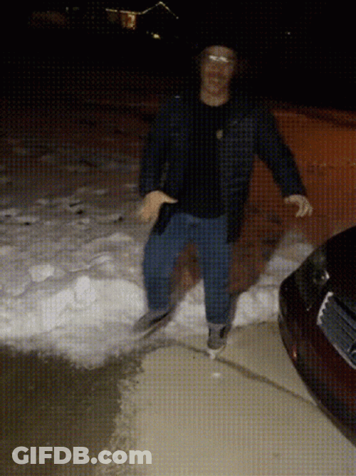 Man's Comical Struggle With Slipping On Ice GIF