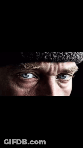 Man's Eyes Close Up With Hat GIF