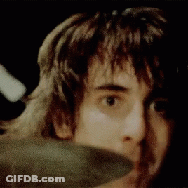 Man's Face Close Up Black Background GIF