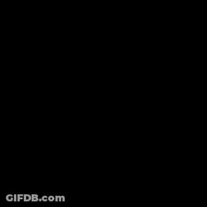 Man's Face Close Up Black Background GIF