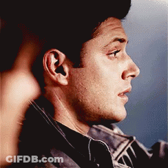 Man's Face Close Up Blue Background GIF