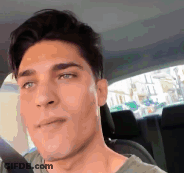 Man's Face Close Up In Car GIF