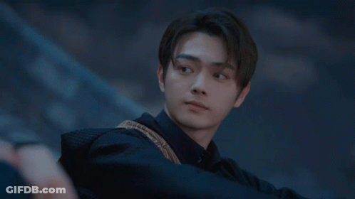 Man's Face Close Up In Dark GIF