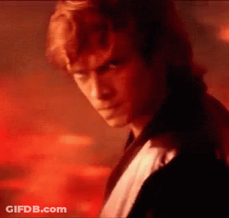 Man's Face Close Up In Dark Room GIF