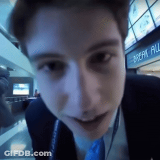 Man's Face Close Up In Front Of Break All Sign GIF