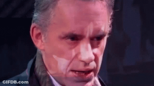 Man's Face Close Up Purple Background GIF