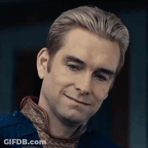 Man's Face Close Up Slight Smile GIF
