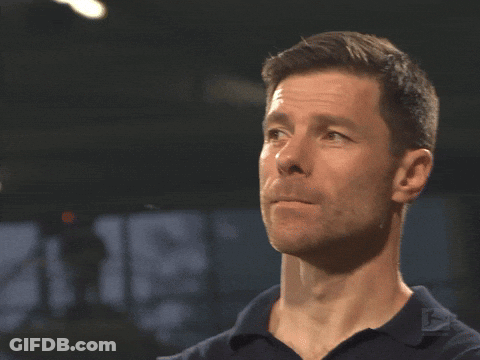 Man's Face Close Up With B Shirt GIF