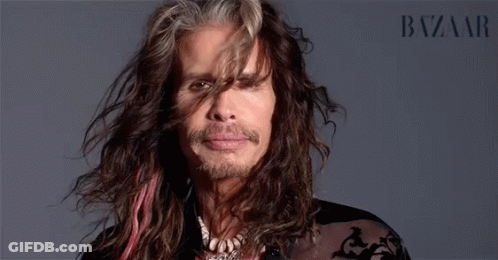 Man's Face Close Up With Harper's Bazaar GIF