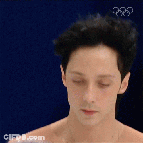Man's Face Close Up With Olympic Rings GIF