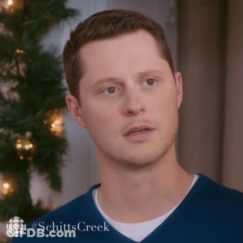 Man's Face Close Up With Schitts Creek GIF