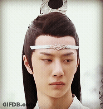 Man's Face Close Up With White Headband GIF