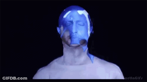 Man's Face Covered In Blue Liquid GIF