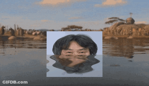Man's Face Floating In Water GIF