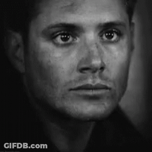 Man's Face In Black And White Photo GIF